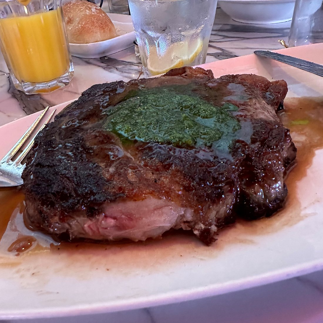 The Stinking Rose signature dishes Ribeye SteakBagna CaldaShort Rib RavioliBarramundi Sea Bass